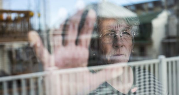 woman with alzheimers and diabetes looking out the window