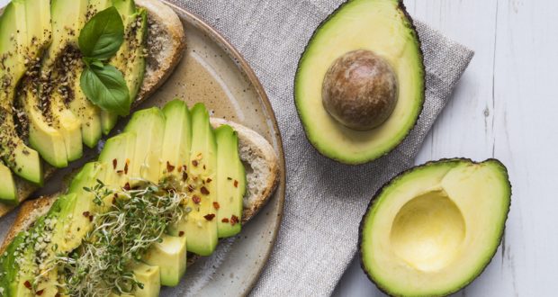 Avocado halved and sliced