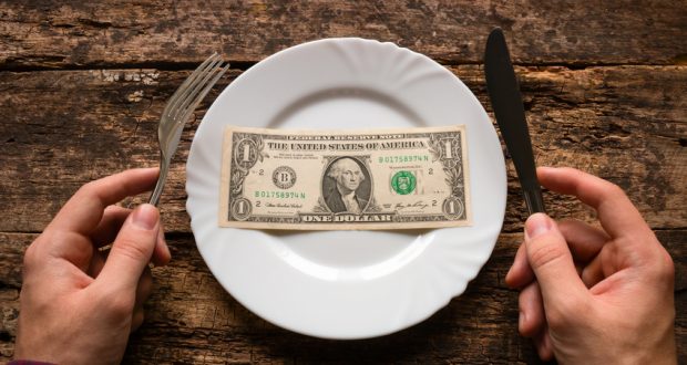 dollar bill on plate