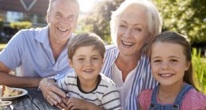 Grandparents enjoying the outdoors with their grandchildren