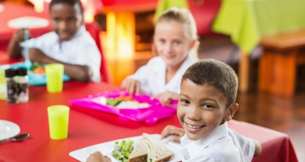 Children eating together at school