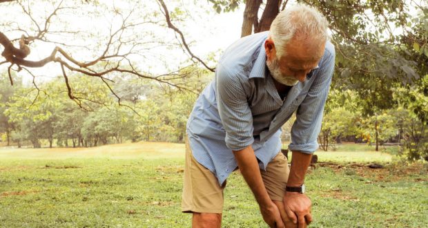 Man suffering from knee joint inflammation and pain