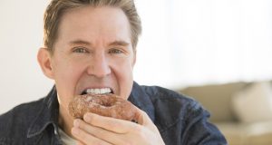 Man eating a doughnut