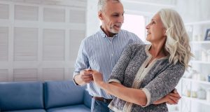 Couple dancing at home