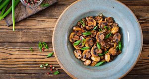 Bowl of mushrooms with herbs