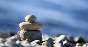 meditation stones against ocean background