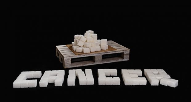 Sugar cubes spelling out the word cancer