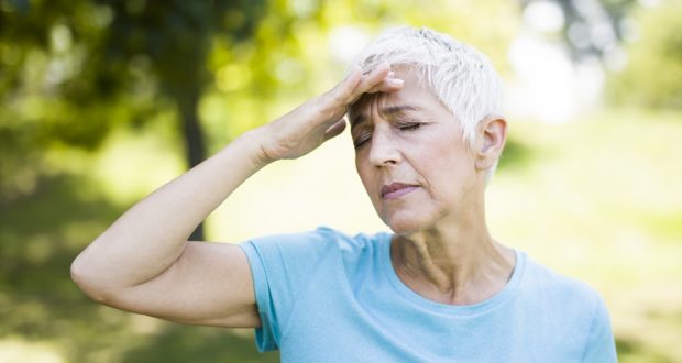 Woman has a headache, not feeling well